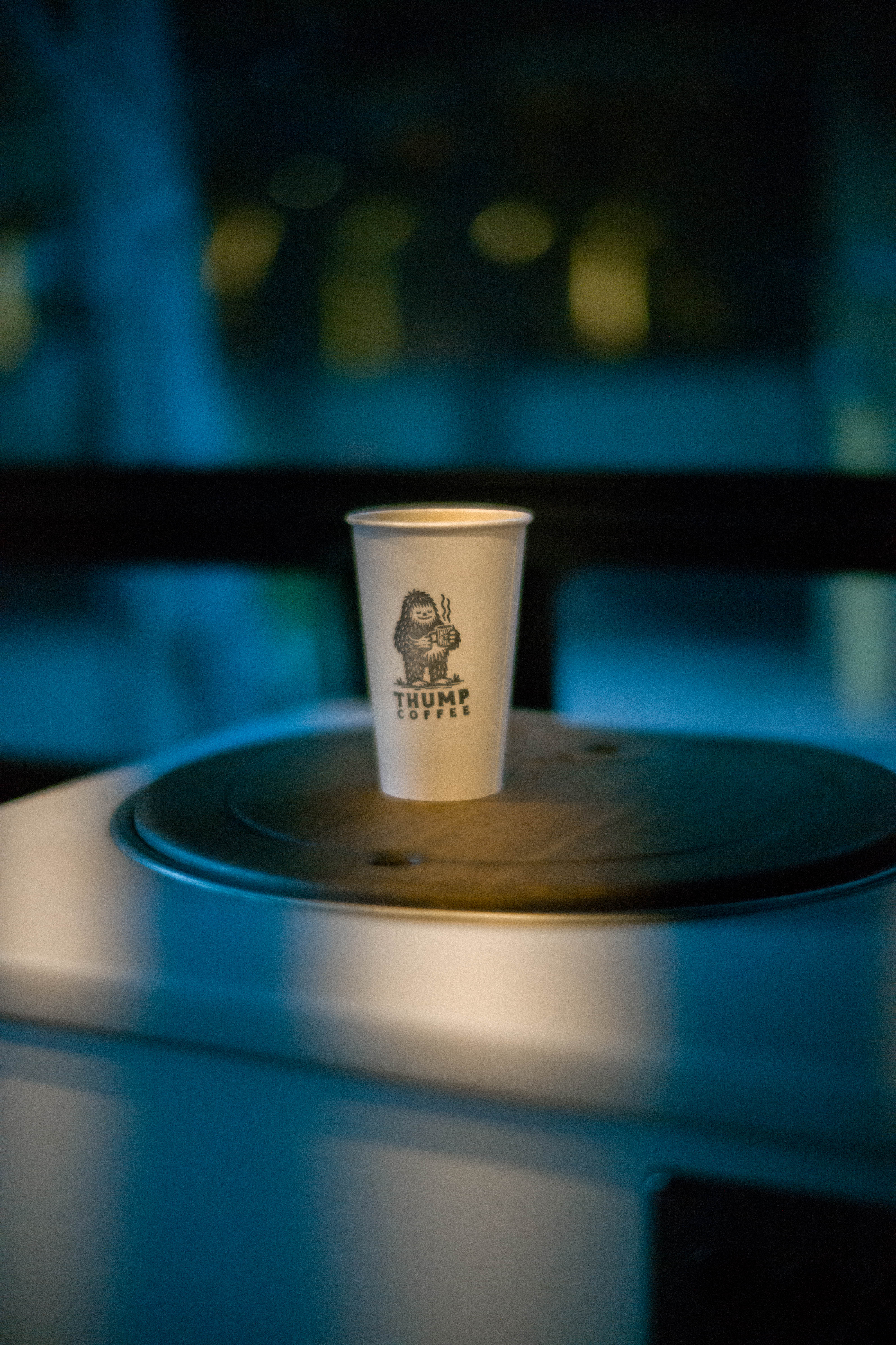 A Thump Coffee cup catching the morning light